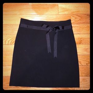 Cute black skirt with a bow